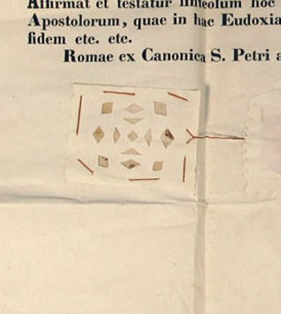 Document with enclosed relic of rust from the True Chains of Saint Peter, the Apostle.